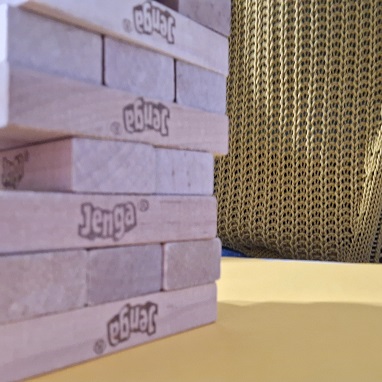 Image of a Jenga-tower showing a gap in the foundations of the tower